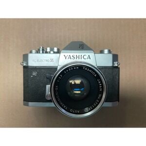 Vintage Yashica TL Electro X 35mm Film Camera w/ 50mm Lens & Booklet - Untested